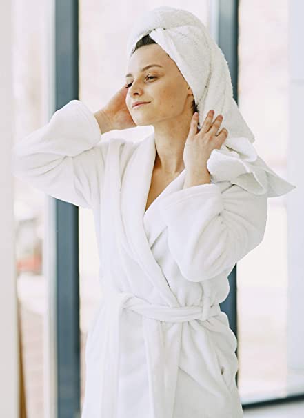 Young woman in white towels Young woman in white towels
