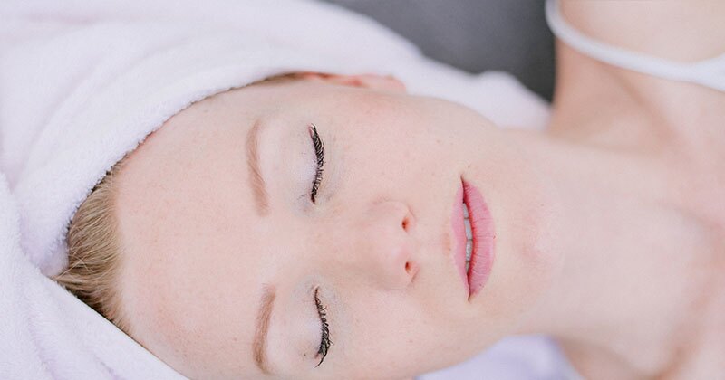 a woman in a relaxing spa treatment